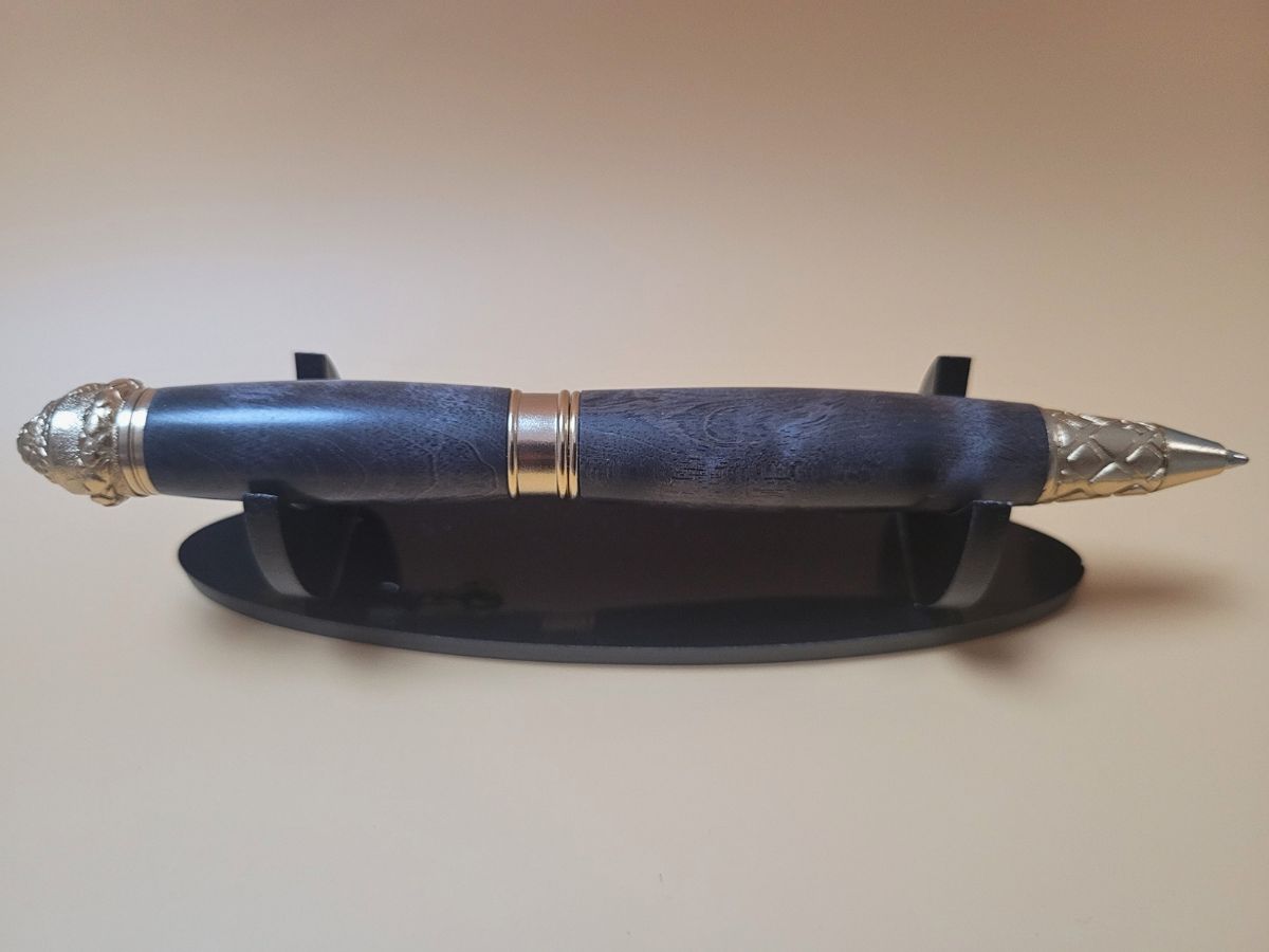 stylo serpent placage or et loupe noire