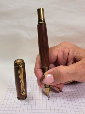 Roller artisanal haut de gamme en padouk massif avec finition bronze et bagues ciselées